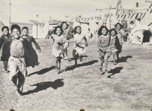 Children running at Santa Ana Pueblo, one of the high-resolution images provided at the request of the Pueblo of Santa Ana, one of the tribal nations who partnered with the library as part of the Mellon-funded planning grant.