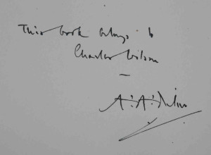 The copy of Winnie-the-Pooh inscribed by Milne on the front free endpaper