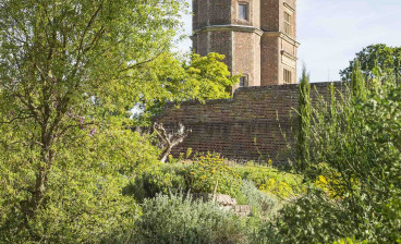 A view of Vita Sackville-West's historic Writng Tower from the completed Delos garden