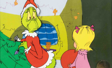 Detail from the production-cel pairing of the Grinch and Cindy-Lou Who as she catches the Grinch in the act of stealing Christmas