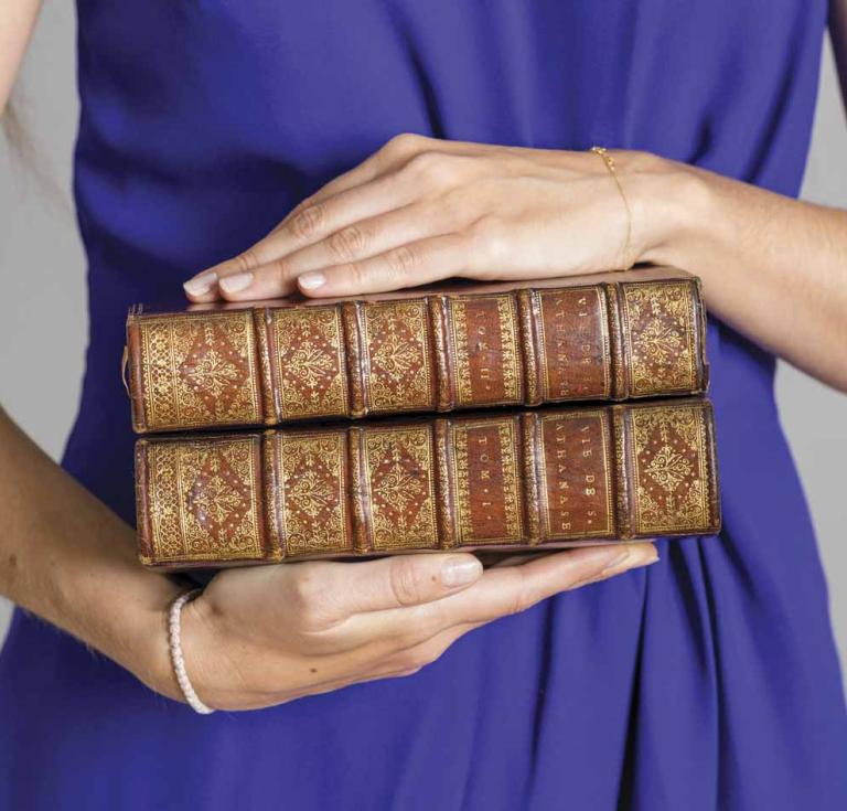 woman holding books
