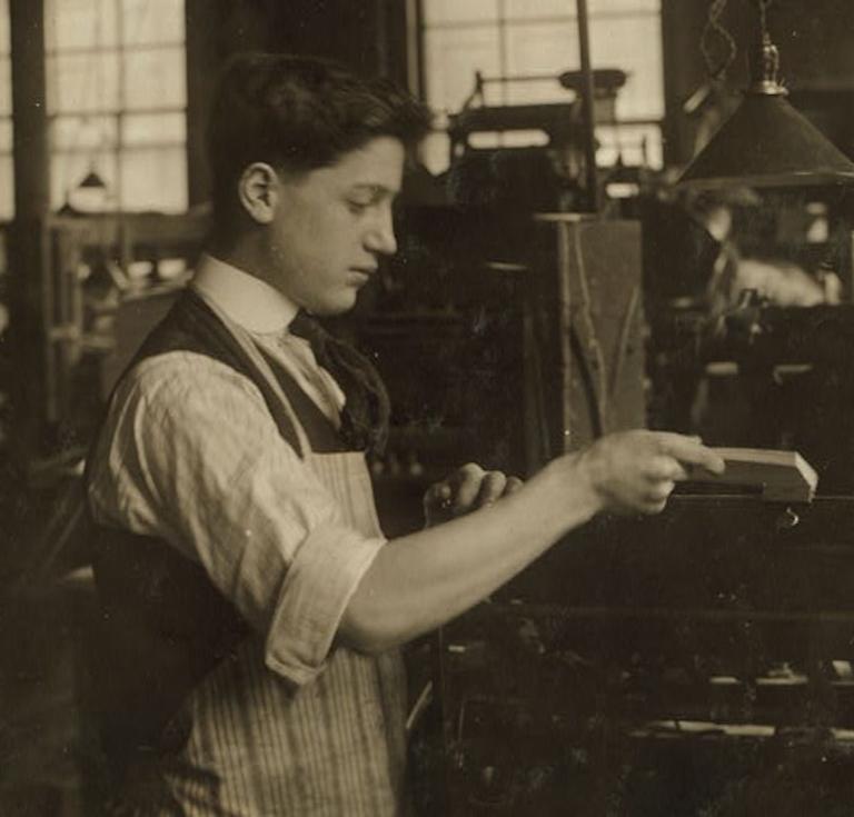 Operating an automatic press. Boston Index Card Co., 113 Purchase Street. Lewis W. Hine, 1917