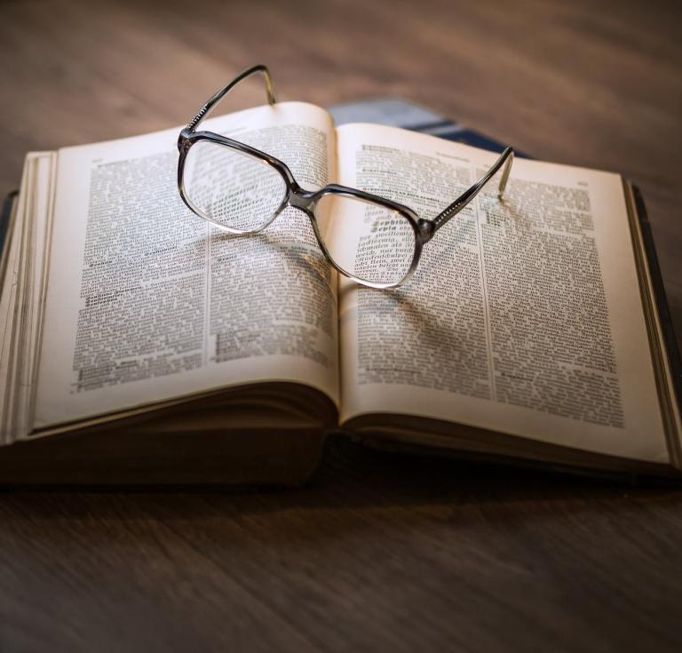 a book and glasses