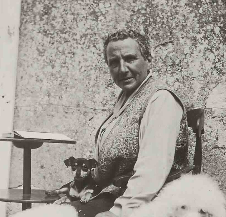 Gertrude Stein at Bilignin, France, with her dogs Pépé and Basket, ca. 1933