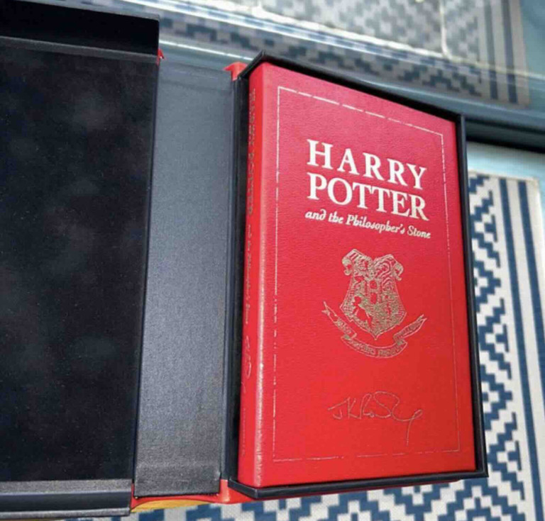 Chloe Esslemont's copy of Harry Potter and the Philosopher's Stone in its traycase