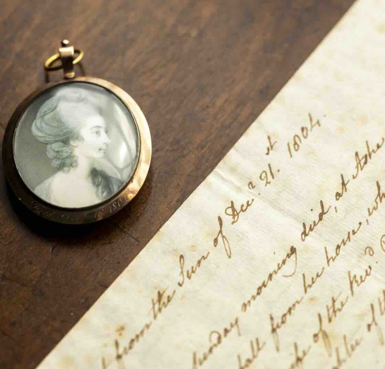 The Anne Lefroy miniature with her obituary copied out from The Sun newspaper by Jane Austen.