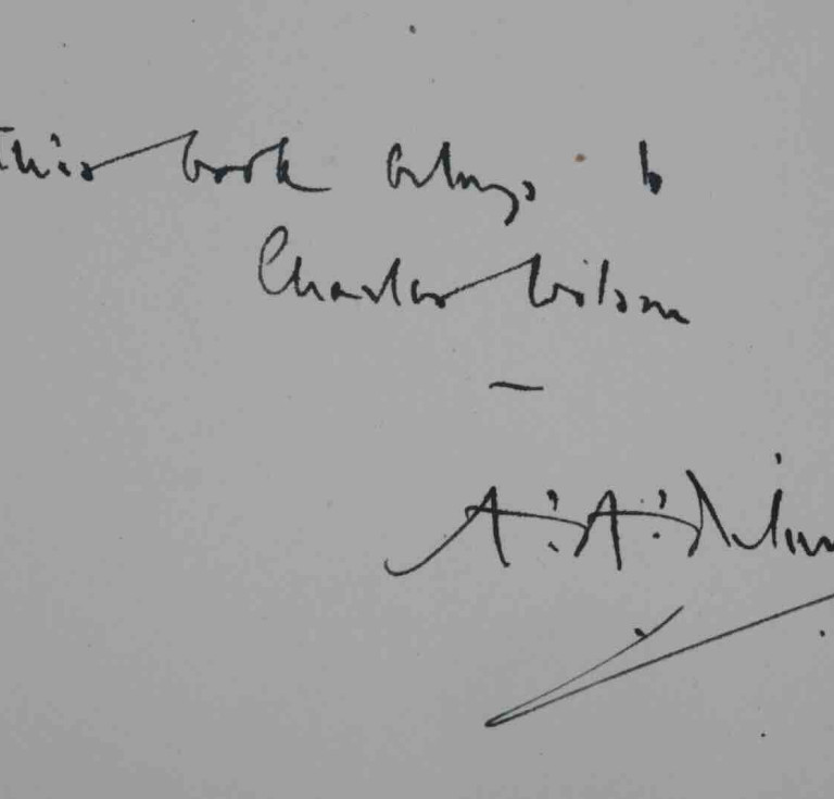 The copy of Winnie-the-Pooh inscribed by Milne on the front free endpaper